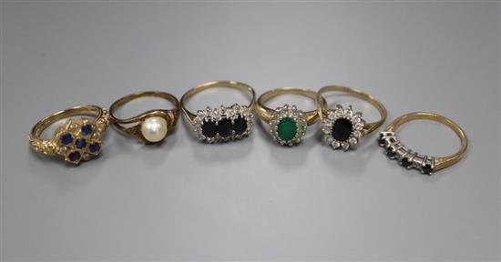 Six assorted 9ct gold and gem set rings, gross 16.9 grams.